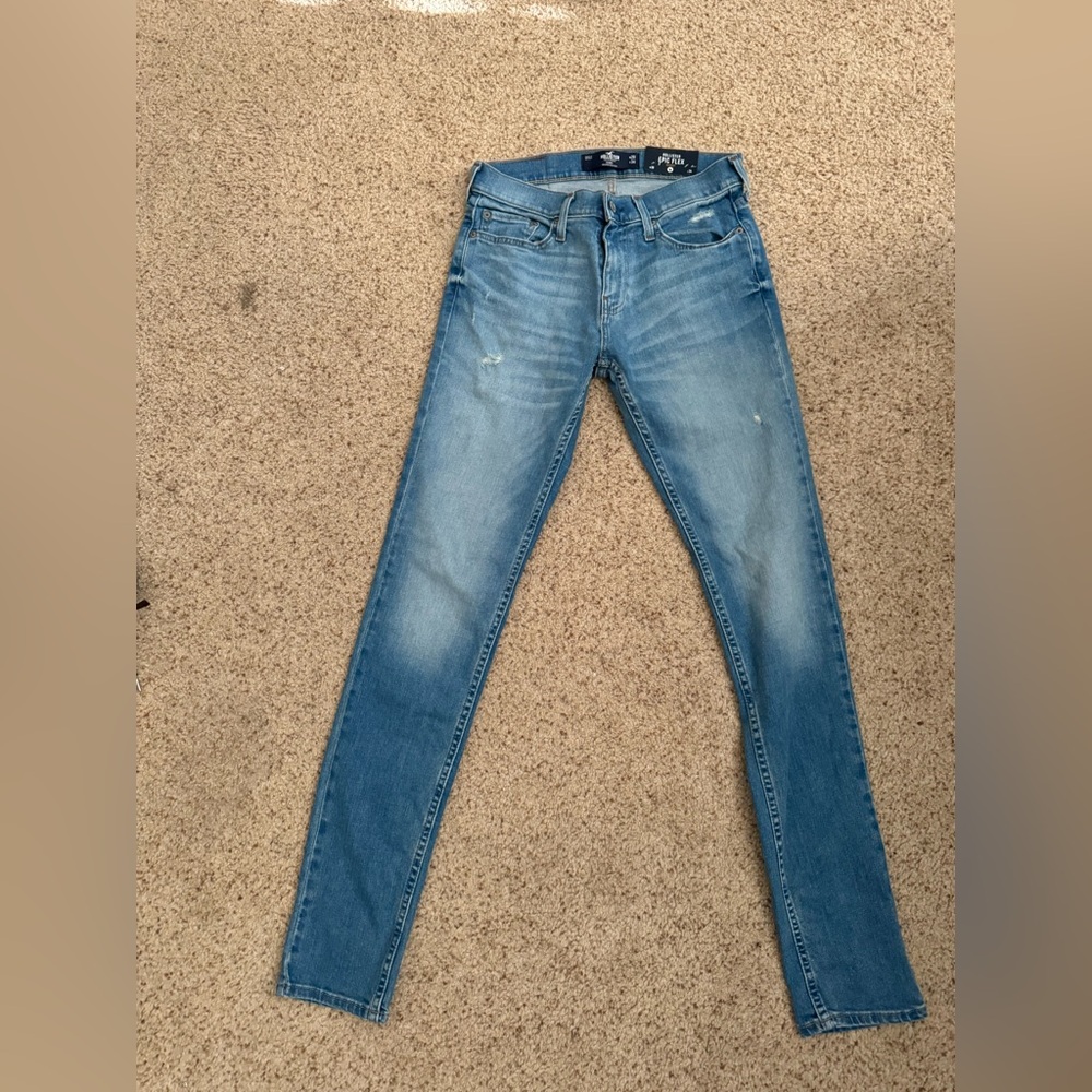 Hollister blue slim straight jeans with little rips- new with tag